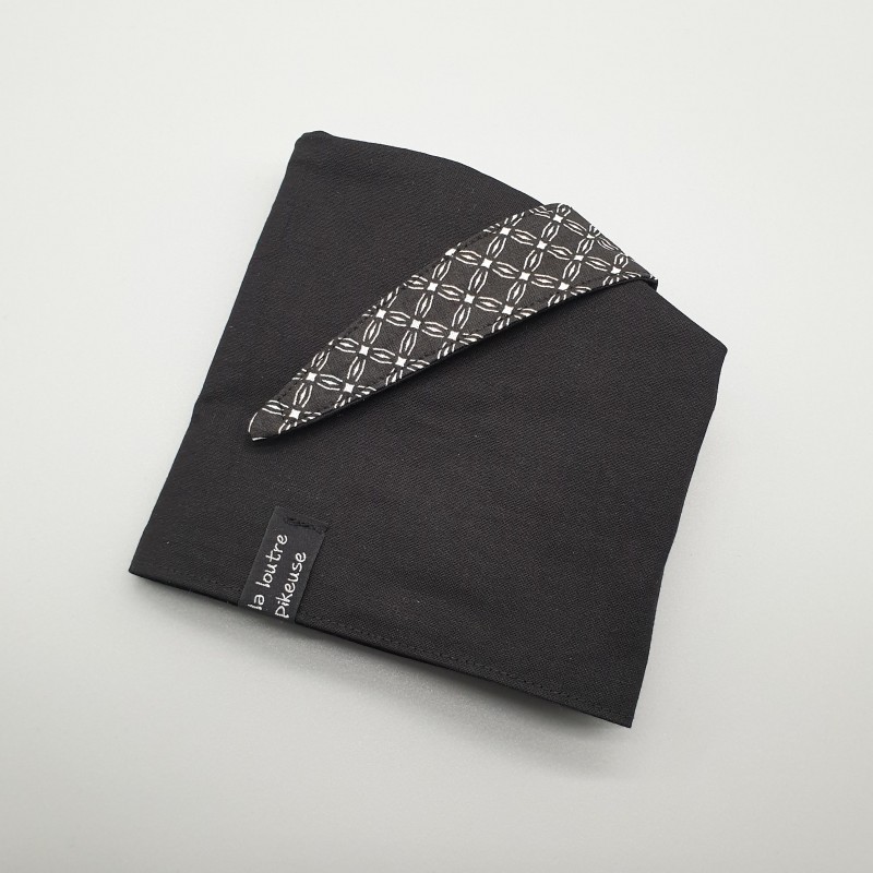 Calot de bloc couvrant réversible - fleurs géométriques noires et noir uni