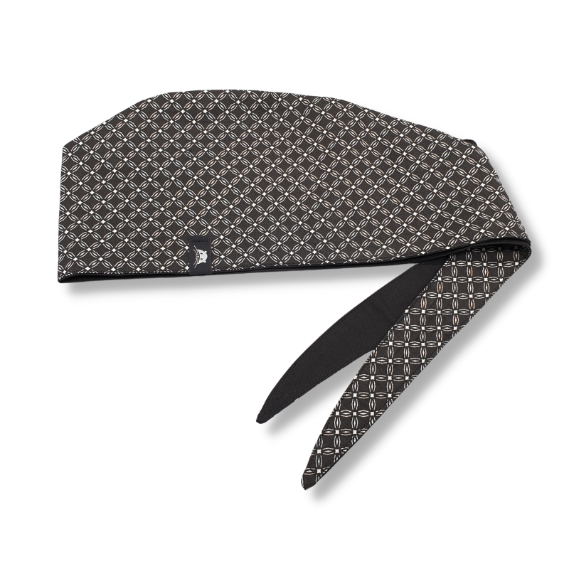 Calot de bloc couvrant réversible - fleurs géométriques noires et noir uni