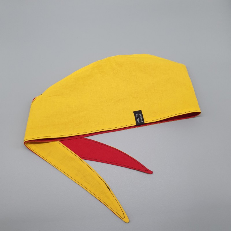 Calot de bloc couvrant réversible - rouge et jaune unis
