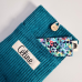 Pochette à livre velours côtelé à personnaliser avec un prénom