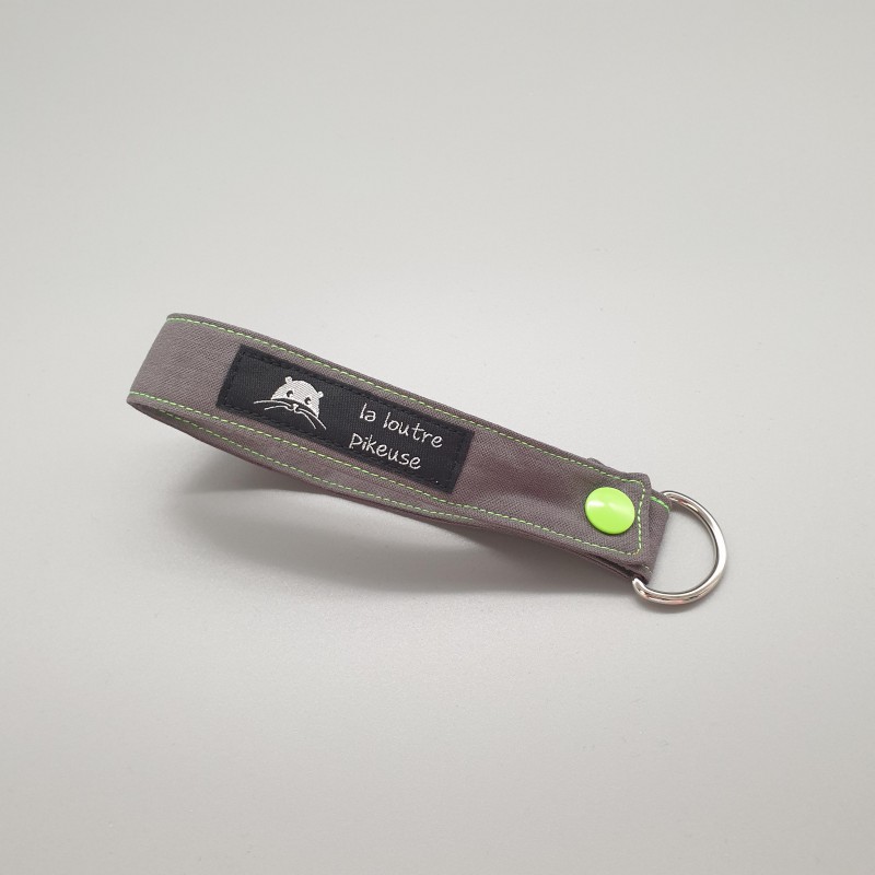 Porte-clés capsule fluo - gris