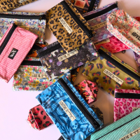 aLes ventes privées - pochettes Reverso et trousses