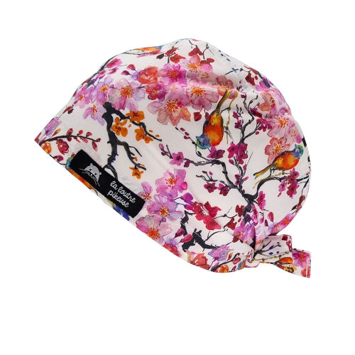 Calot de bloc couvrant fleuri rose avec des petits oiseaux
