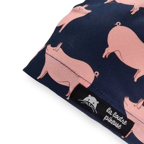 Calot de bloc couvrant avec des cochons