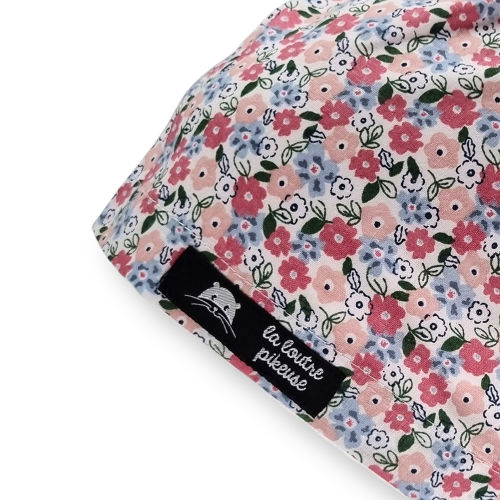 Calot de bloc couvrant avec des fleurs roses