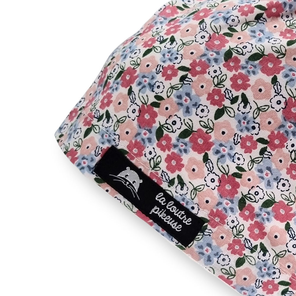 Calot de bloc couvrant avec des fleurs roses