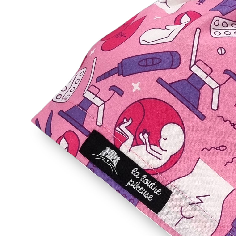 Calot de bloc couvrant rose avec des motifs de grossesse