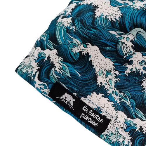 Calot de bloc couvrant avec des vagues bleu turquoise