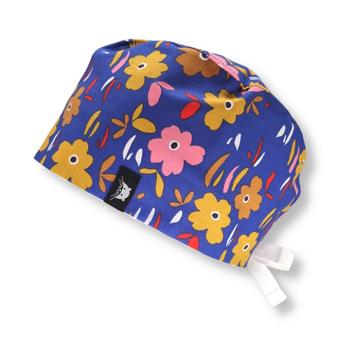 Calot court en tissu avec des fleurs jaunes et roses sur fond bleu