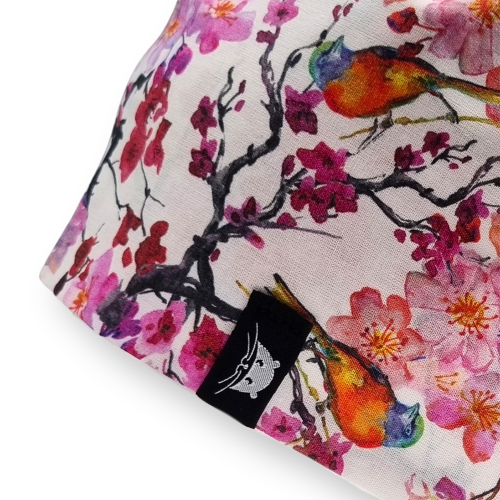 Calot de bloc court fleuri rose avec des petits oiseaux
