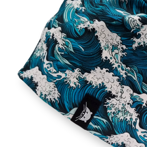 Calot de bloc court avec des vagues bleu turquoise