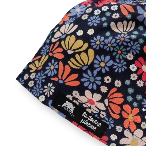 Calot de bloc couvrant avec des fleurs bleues