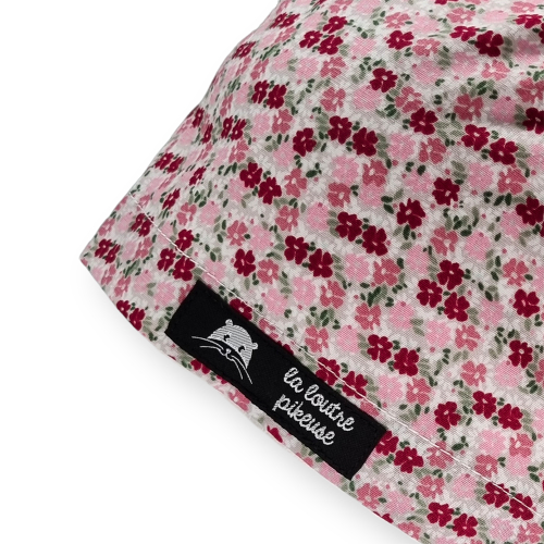Calot de bloc couvrant avec des fleurs roses