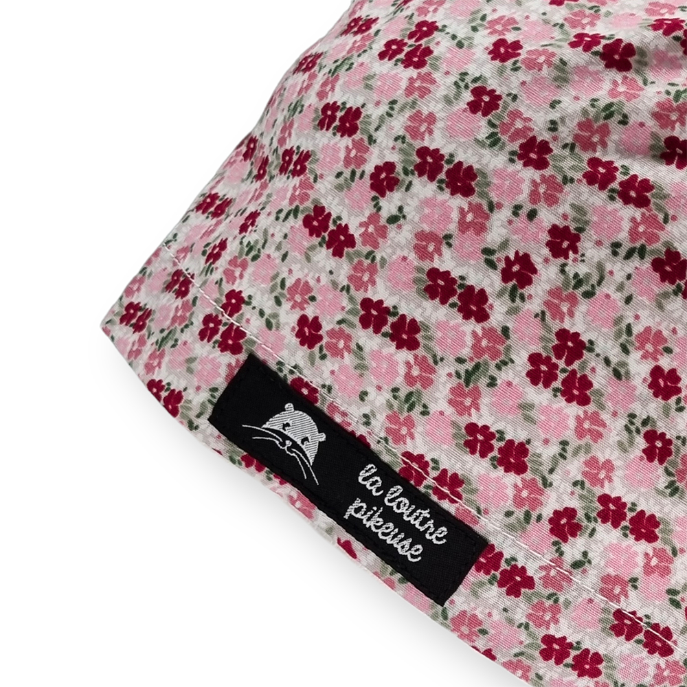 Calot de bloc couvrant avec des fleurs roses