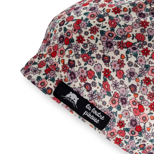 Calot de bloc couvrant avec des fleurs roses