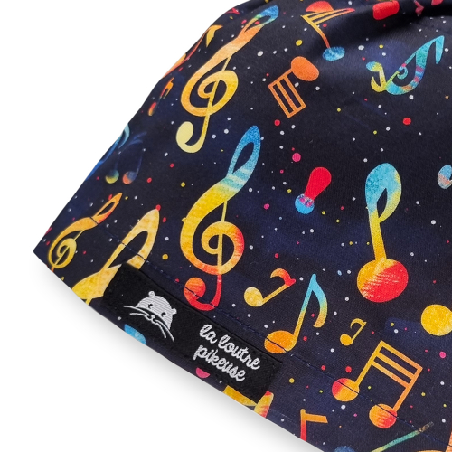 Calot de bloc couvrant avec des notes de musique