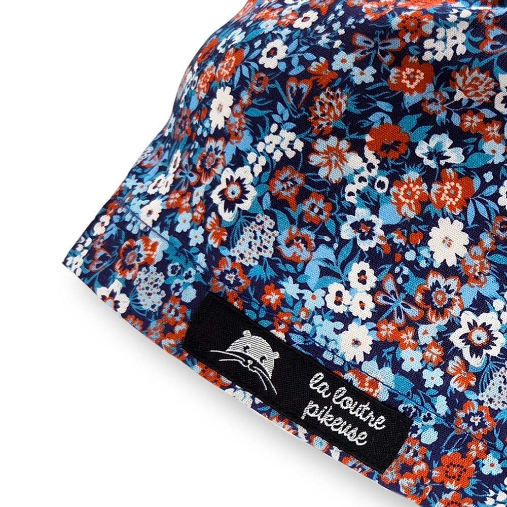 Calot de bloc couvrant avec des fleurs bleues et oranges