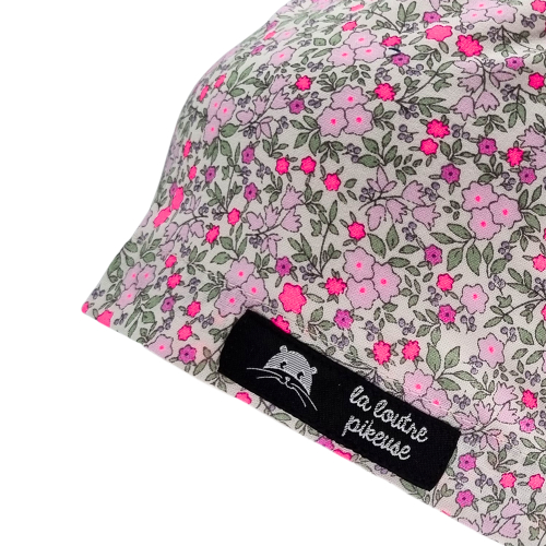 Calot de bloc couvrant avec des fleurs roses fluo