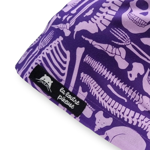 Calot de bloc couvrant avec des os, truamatologie, orthopédie violet