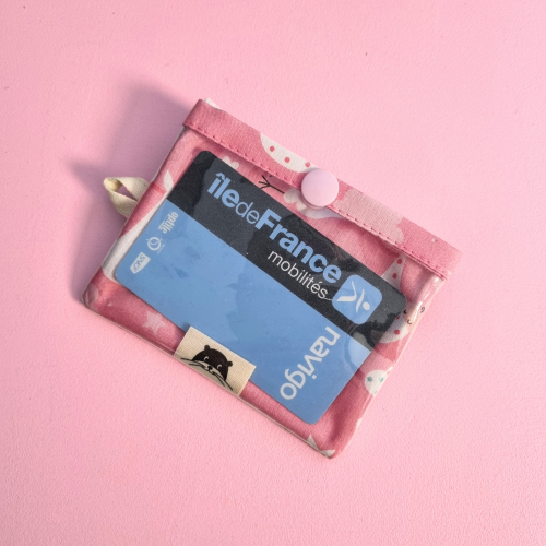 Porte-badge zippé avec des cigognes roses