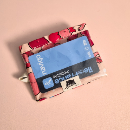 Porte-badge zippé avec des organes