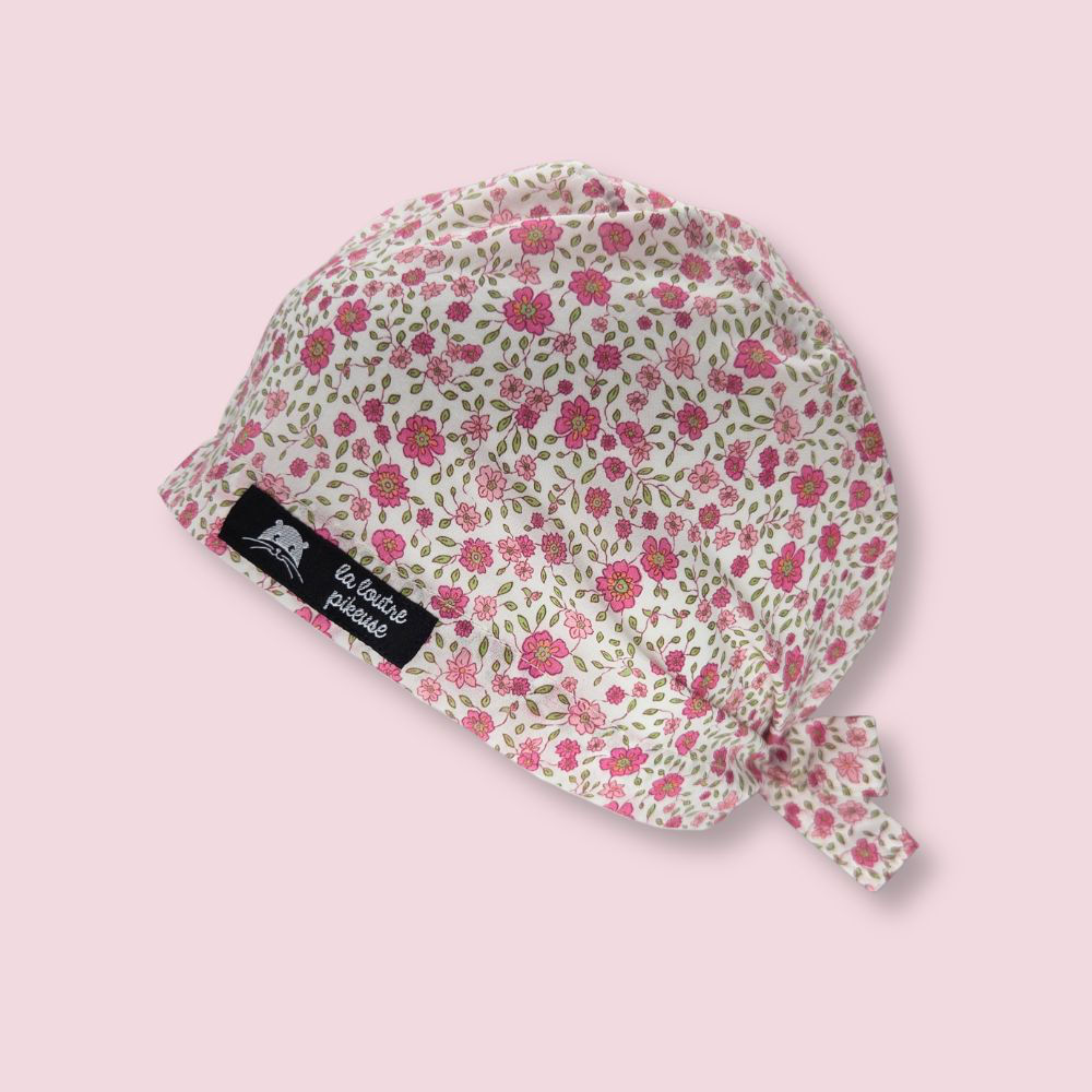 Calot couvrant avec des petites fleurs roses